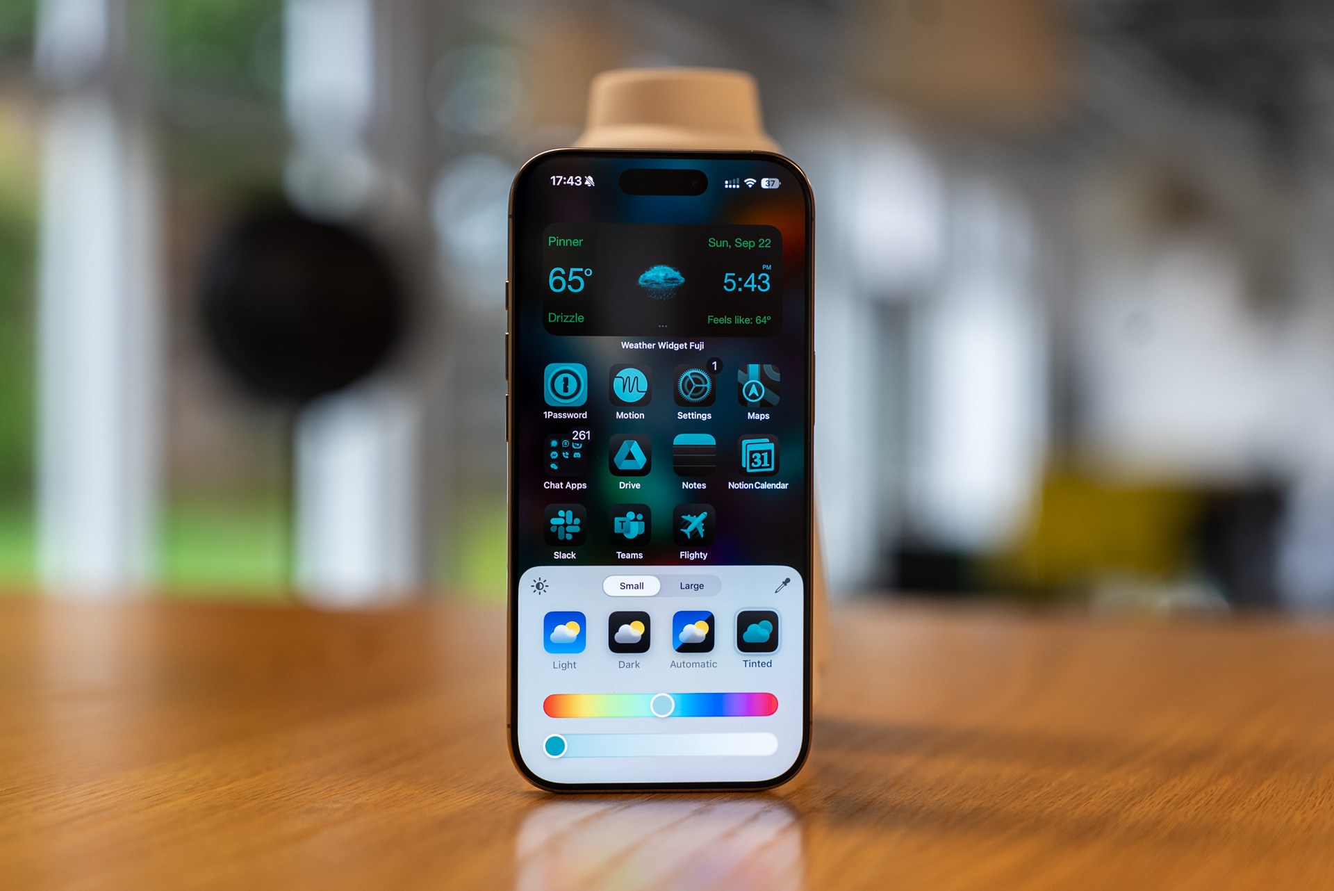 iPhone screen displaying iOS 18 homescreen app icon tint customization options, with potential for more advanced layout controls in iOS 19.