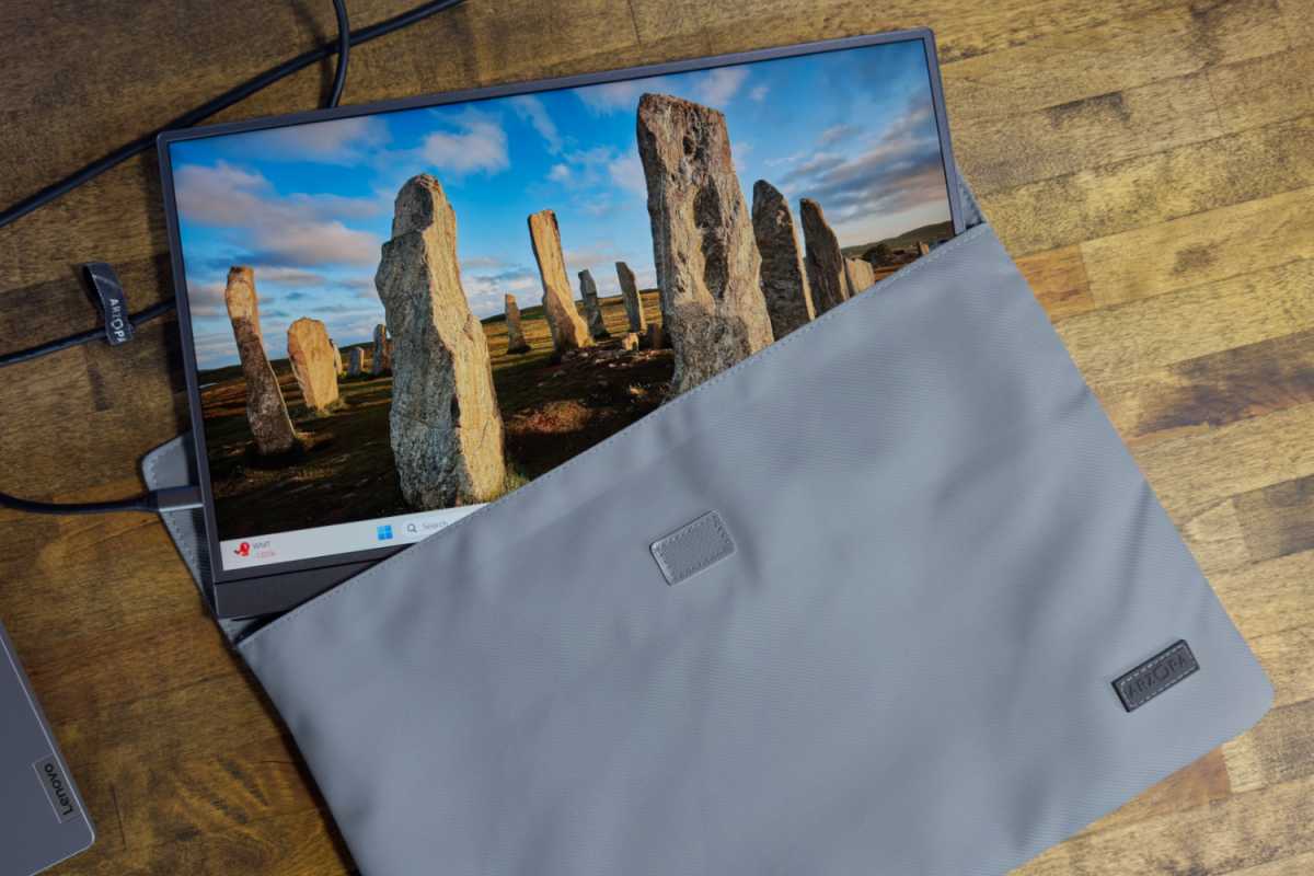 Arzopa Z1FC portable display partially inserted into its included ribbed fabric carrying case.