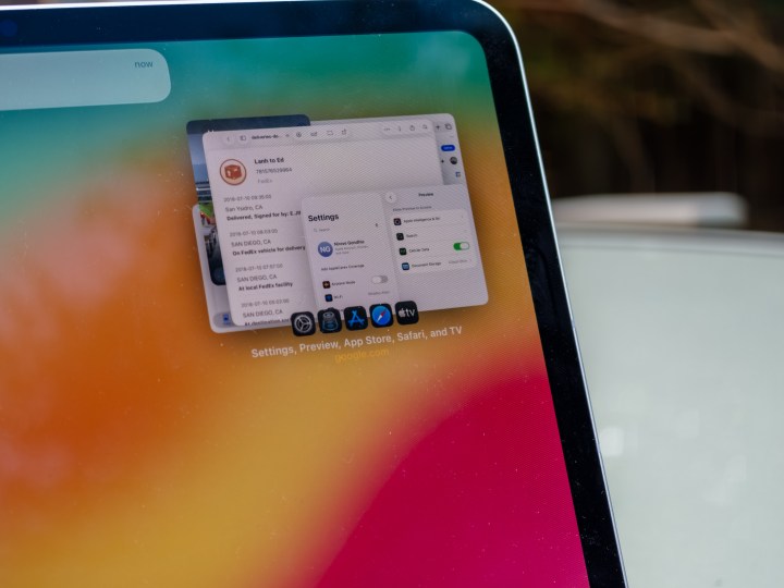 iPadOS 26 Expose view showing several stacked application windows for easy task switching on iPad Pro.