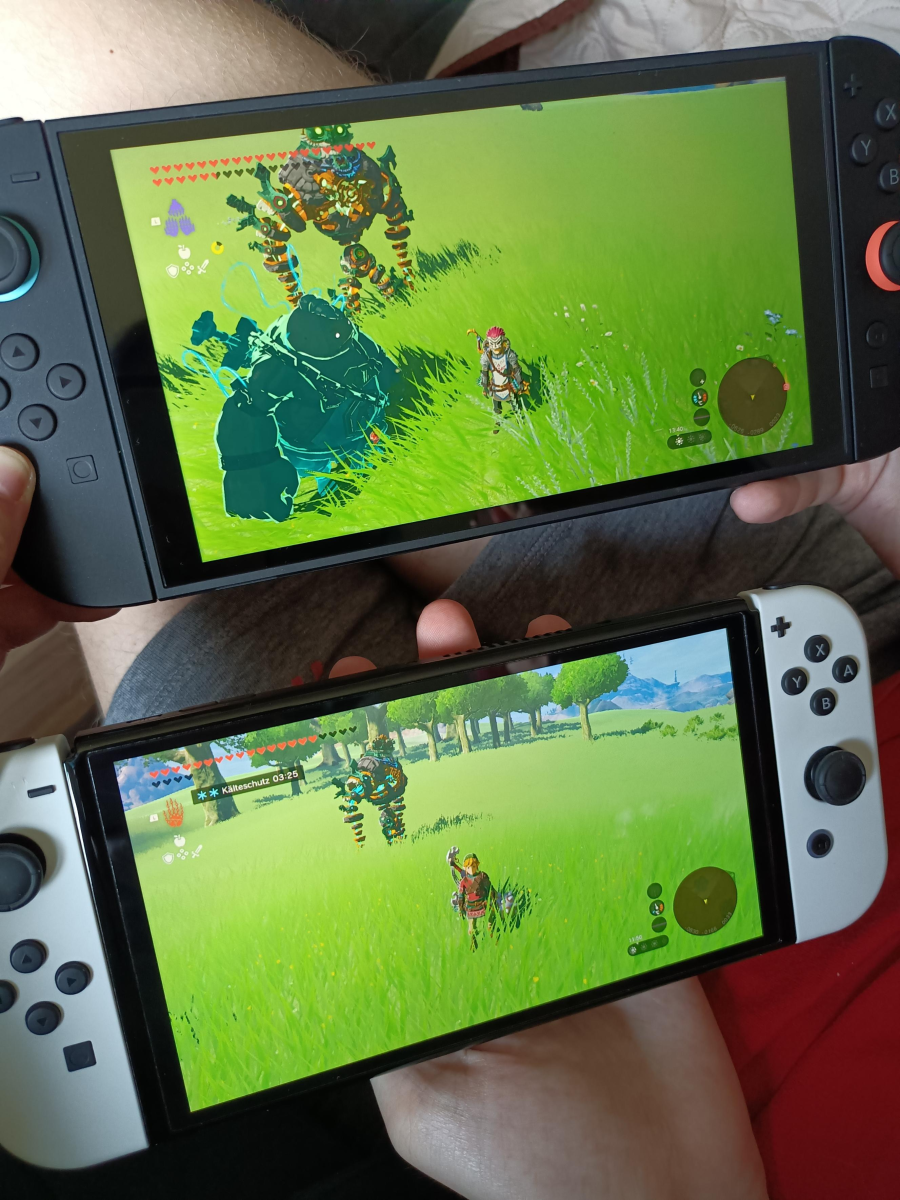 Nintendo Switch 2 LCD screen displaying a vibrant game scene compared to an OLED, highlighting color richness and contrast levels.