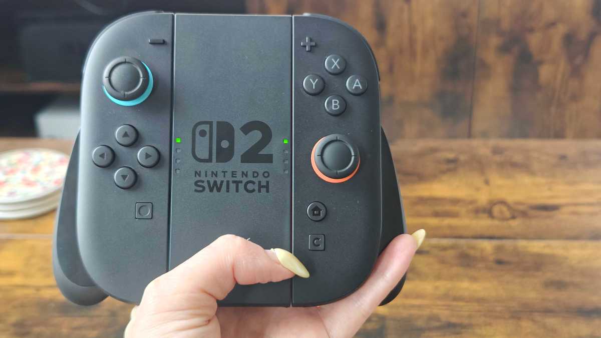 Close-up of the new C button on the Nintendo Switch 2 Joy-Con, used for accessing GameChat features.
