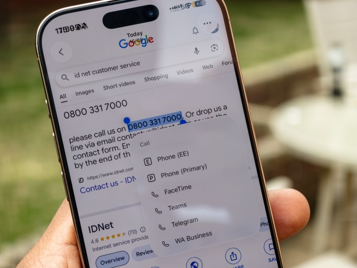 Improved contextual menu in iOS 26 beta for dialing, offering multiple app choices like WhatsApp or Telegram when selecting a phone number.