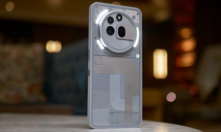 Back panel of the Nothing Phone 3a Pro with its signature Glyph Interface lights illuminated.