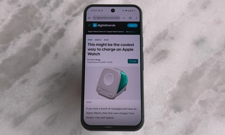 User browsing a website on the Google Pixel 9, highlighting its snappy Android 16 performance.