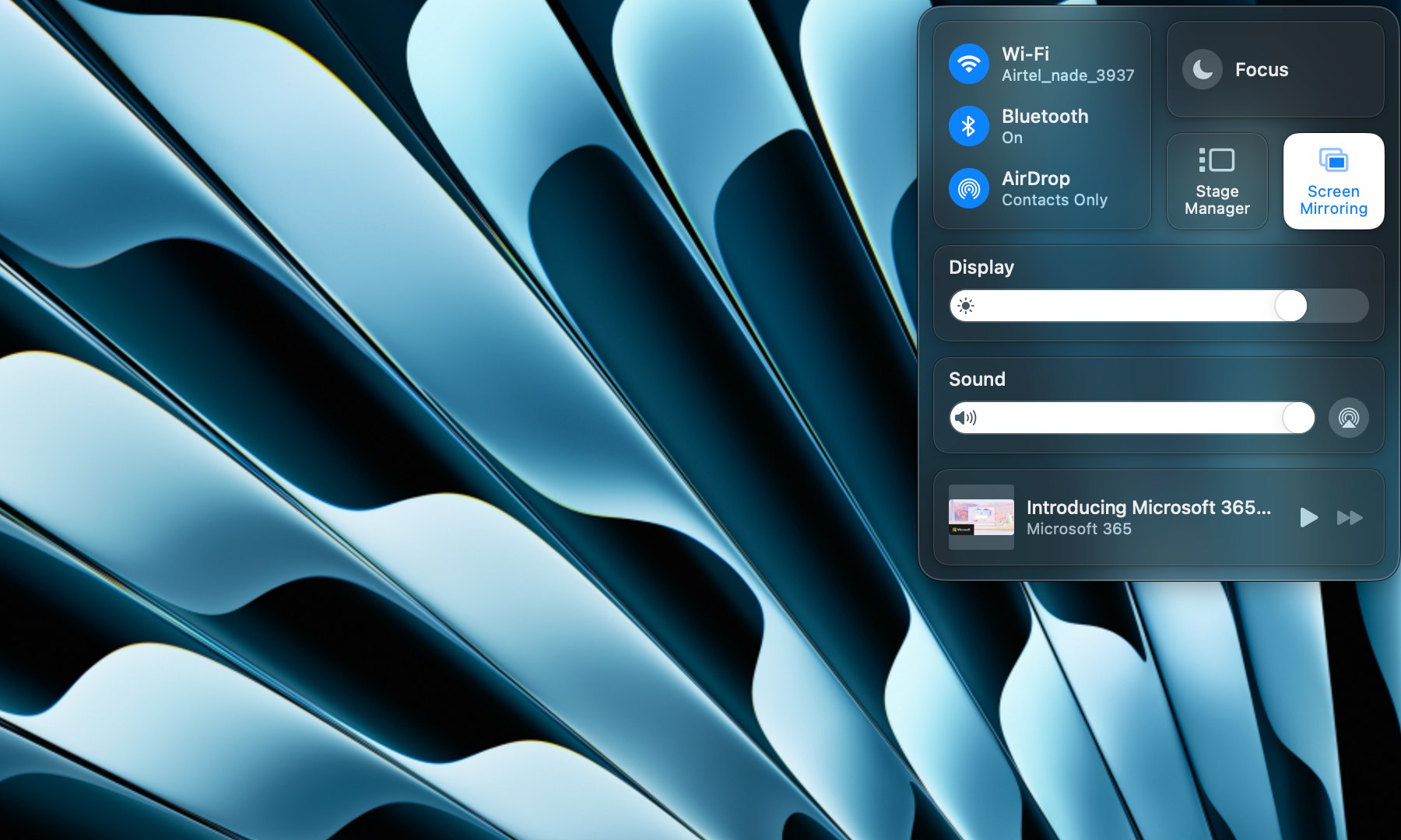 macOS Sequoia Control Center demonstrating existing frosted glass UI elements.