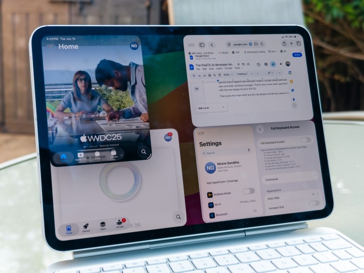 iPad Pro running iPadOS 26 displaying advanced multi-window multitasking capability
