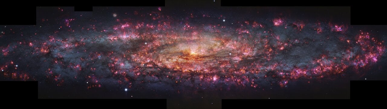 Vibrant multicolored image of the Sculptor Galaxy revealing star formation and gas clouds, captured by VLT's MUSE instrument