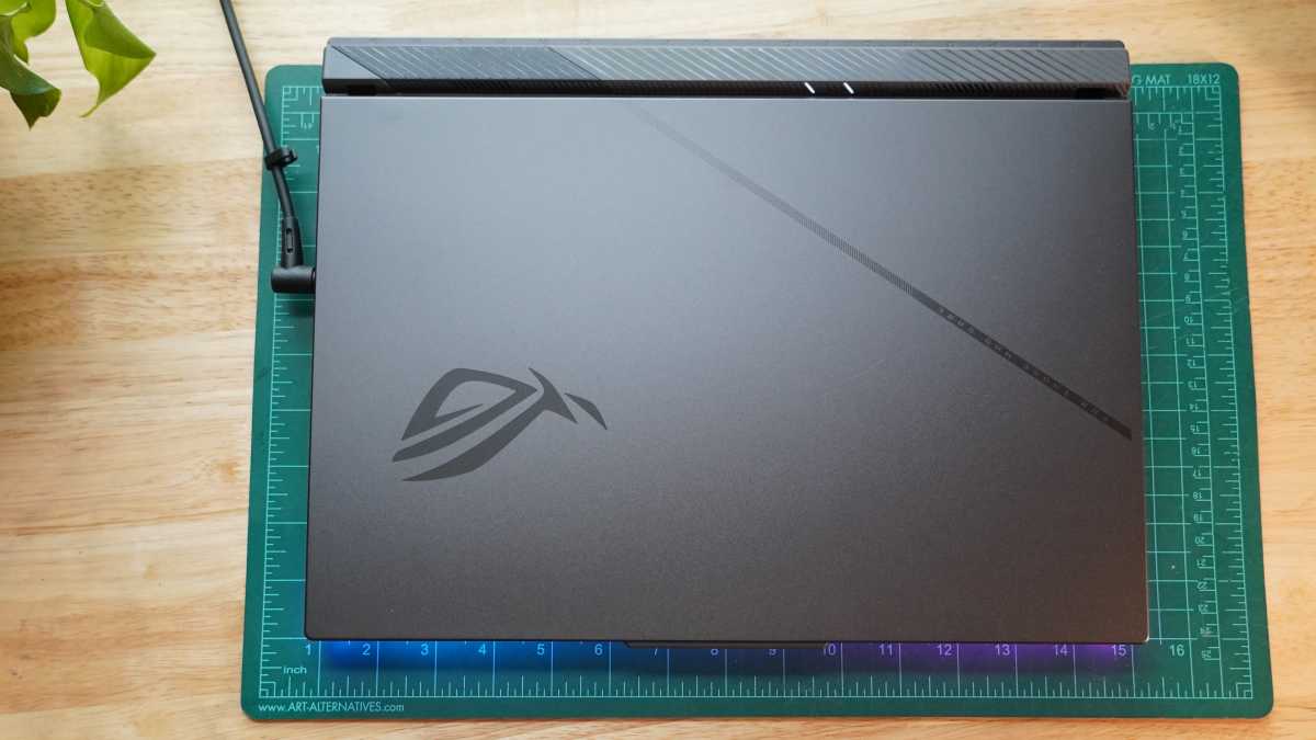 Asus ROG Strix G16 top-down view showing its gaming aesthetic and RGB lighting