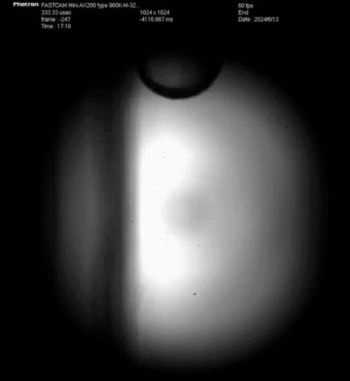 Animated GIF illustrating a soft sphere rolling down a vertical plane, a key finding in contact mechanics research by the University of Waterloo.