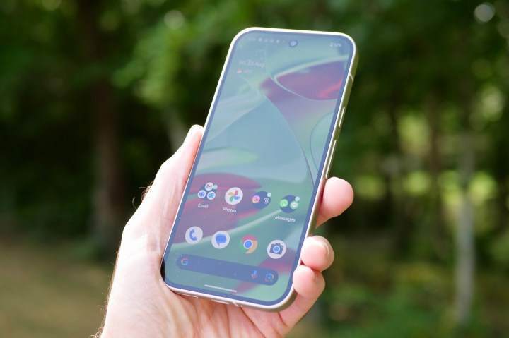 Hand holding the Google Pixel 9, illustrating comfortable daily use for various tasks.