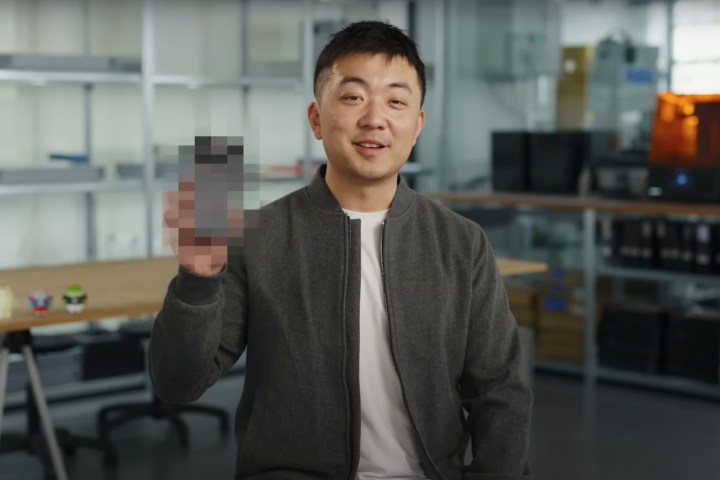 Carl Pei teasing a blurred image of the upcoming Nothing Phone 3 flagship smartphone