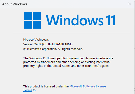 Screenshot of Windows Winver dialog box showing OS version and build number.
